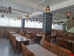 White House Family Restaurant in Padinjarathara, india